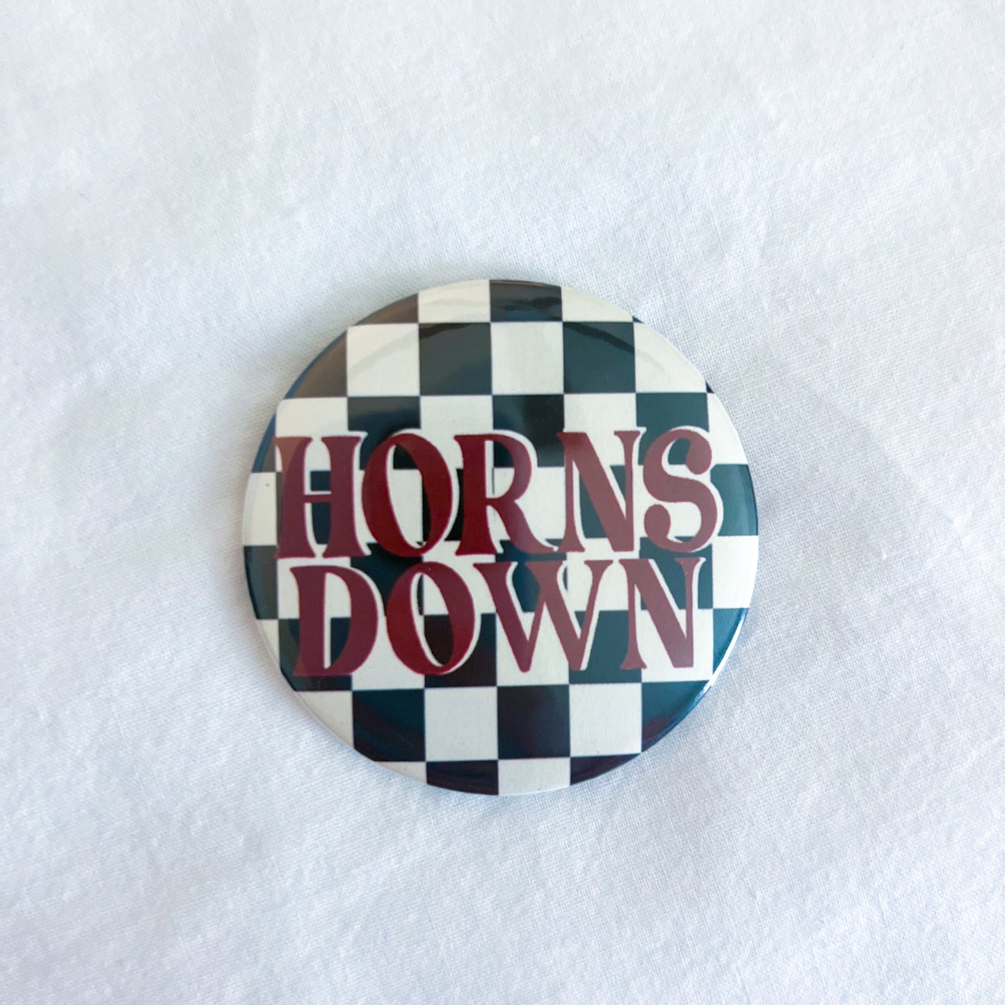 Horns Down Button